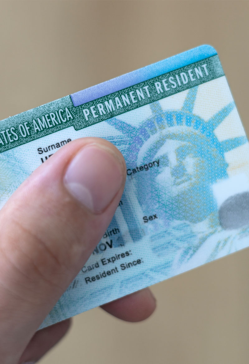 An immigrant receiving their NIW or EB-1A green card.