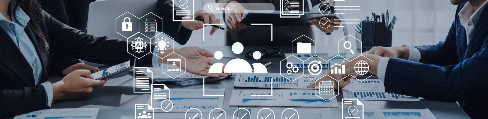 Executives in a meeting reviewing charts as proof for EB-1A immigration eligibility.